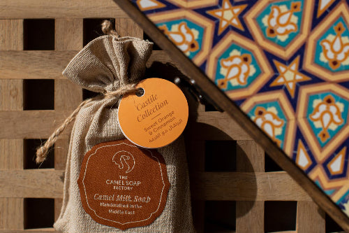 The Camel Soap Factory handmade soap next to traditional handmade wooden gift box