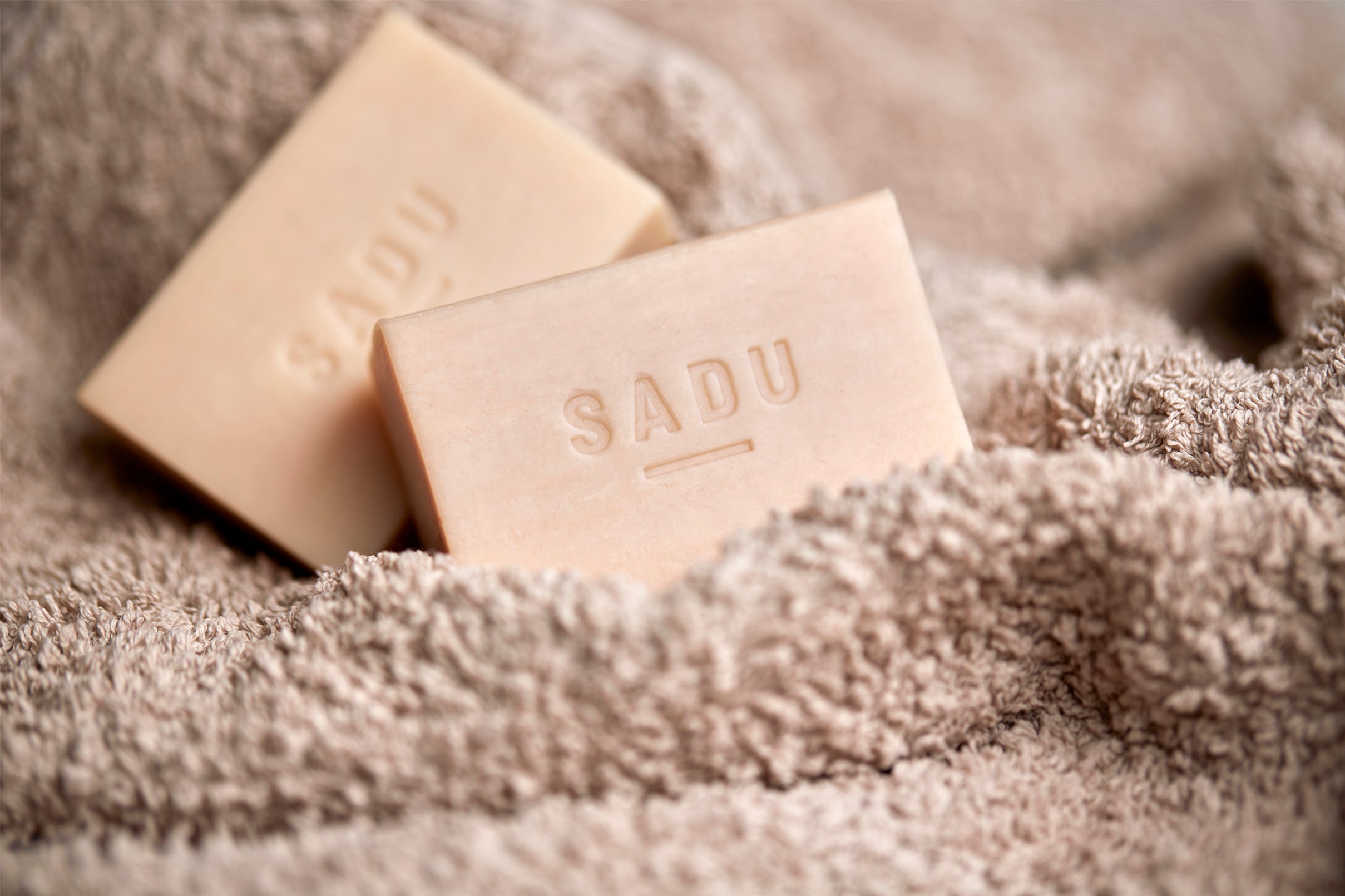 The Camel Soap Factory Milled soap contract manufacturing private label soaps on a towel