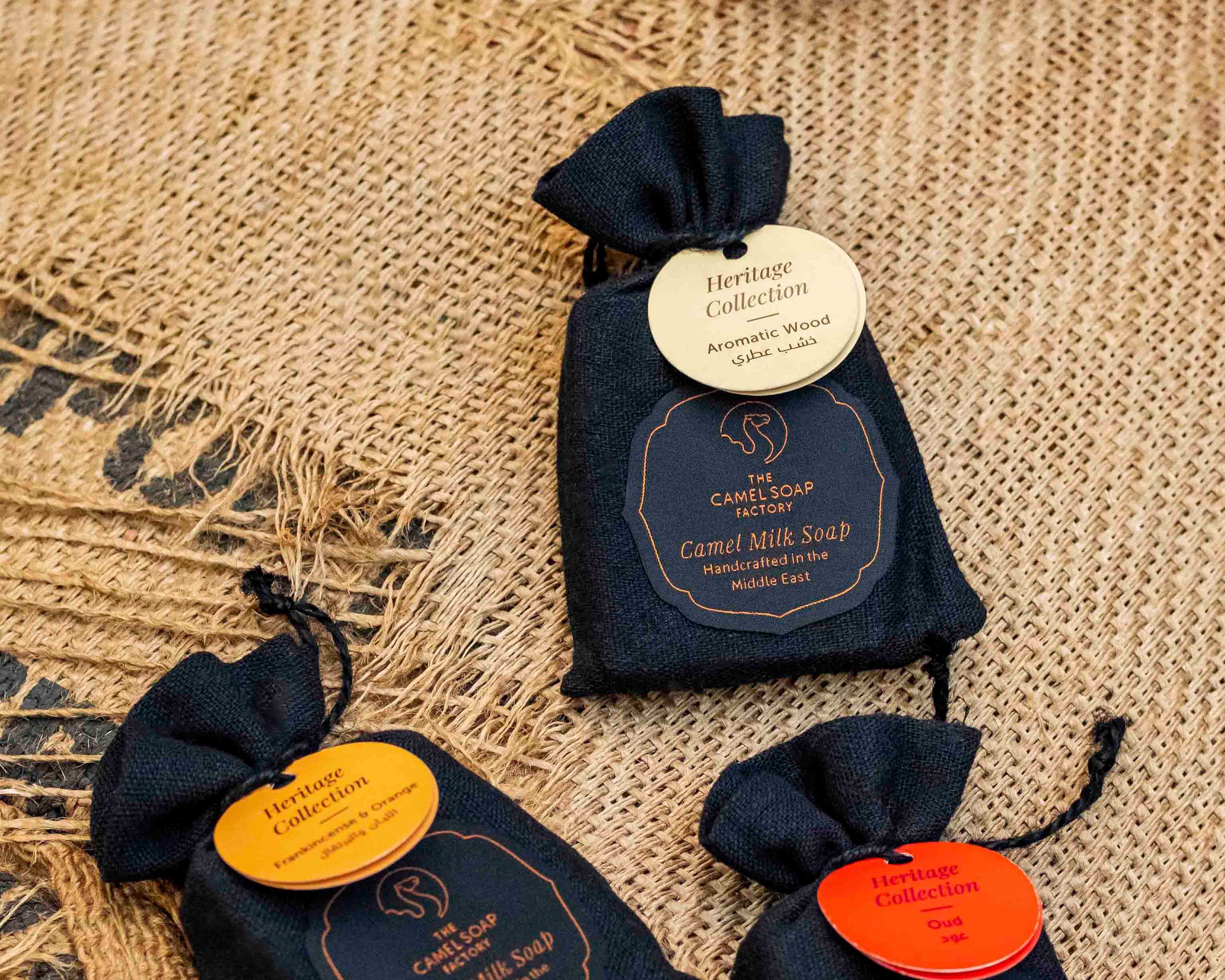 Aromatic Wood Heritage Soap Bar on mat with other heritage soaps