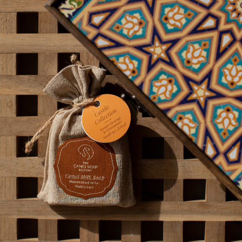 The Camel Soap Factory handmade soap next to traditional handmade wooden gift box
