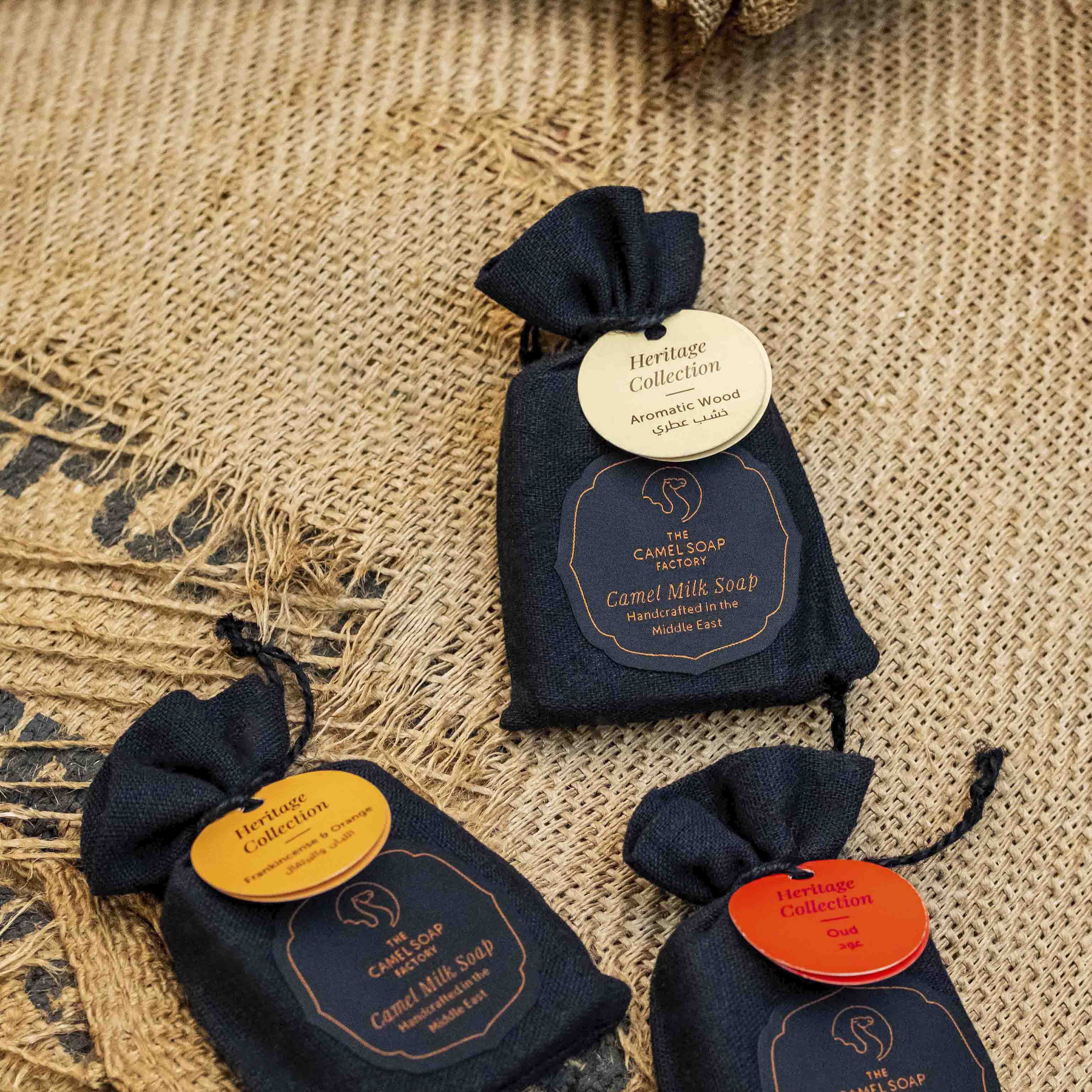 Aromatic Wood Heritage Soap Bar on mat with other heritage soaps